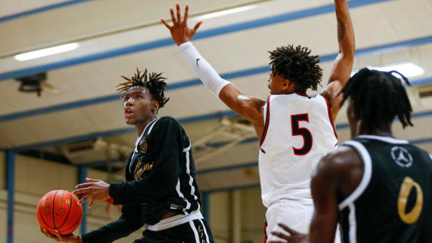 Ja'Kobe Walter of Link Academy, goes to the basket during a game against the Legacy (Texas) Broncos in the Ozark Mountain Shootout at Glendale High School on Thursday, Dec. 8, 2022. Tlink Academy00478